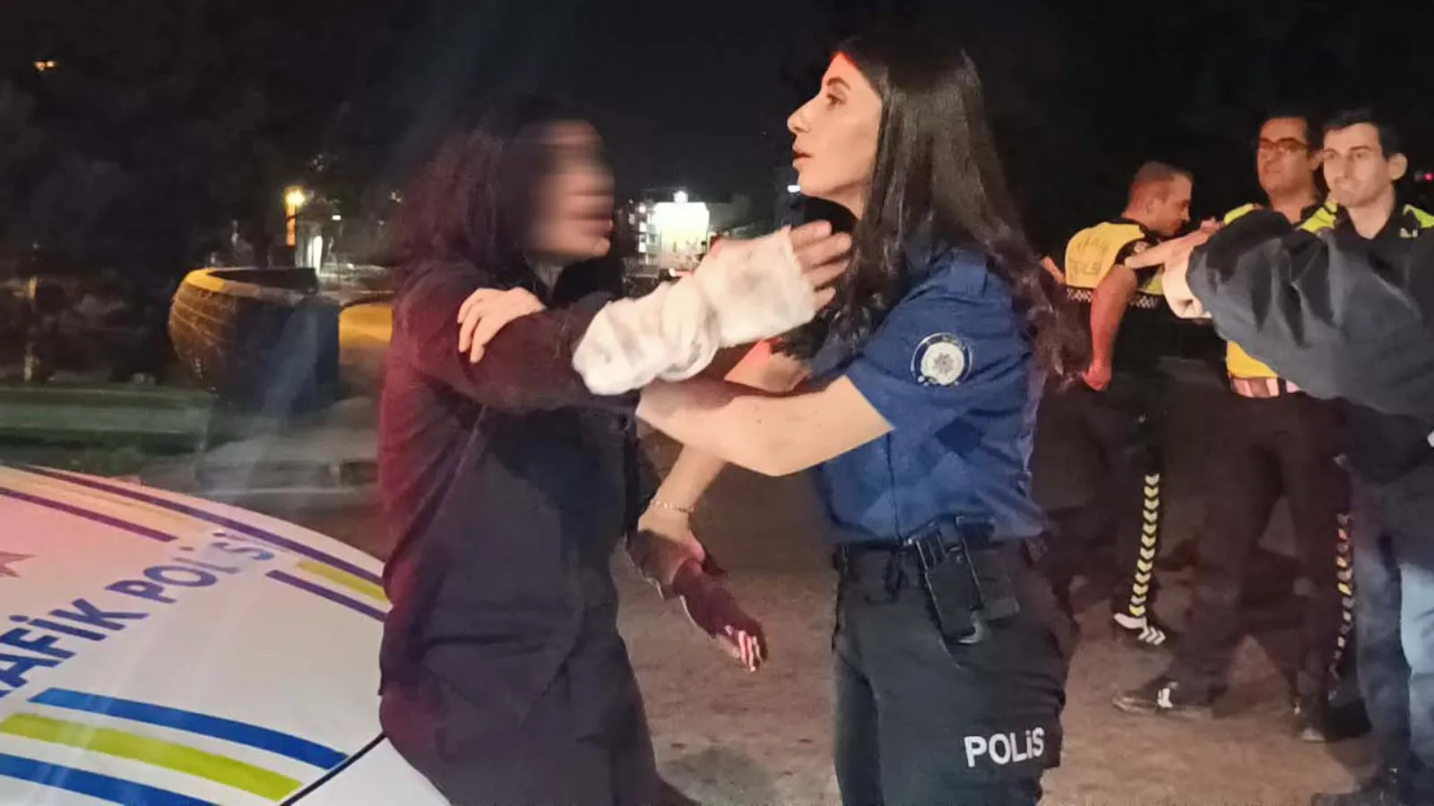 Driver enters wrong-way traffic, attacks police and spits at journalists